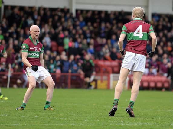 Eoghan Rua captain Colm McGoldrick roars with delight after Barry Daly's first half goal during the County Derry Senior Football Final against Lavey on Sunday. (Photo: James Hislop)