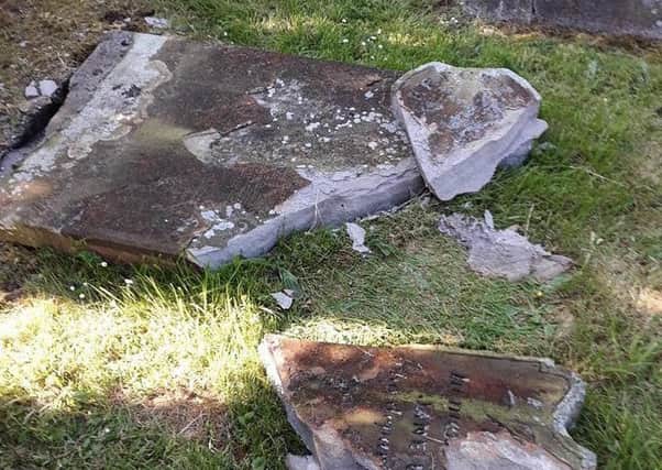 A gravestone at Shankill Parish Graveyard in Lurgan which was vandalised