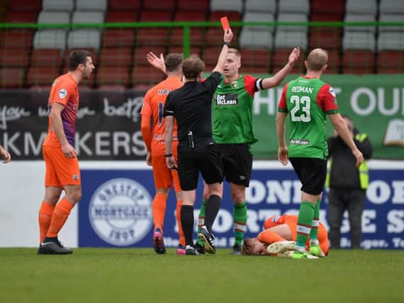 Calum Birney is sent off following a challenge on Mark Sykes.
 Photo Colm Lenaghan/Pacemaker Press
