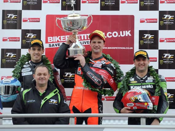 Ryan Farquhar won the inaugural Lightweight race for Supertwin machines at the Isle of Man TT in 2012, beating James Hillier (left) and Michael Rutter.
