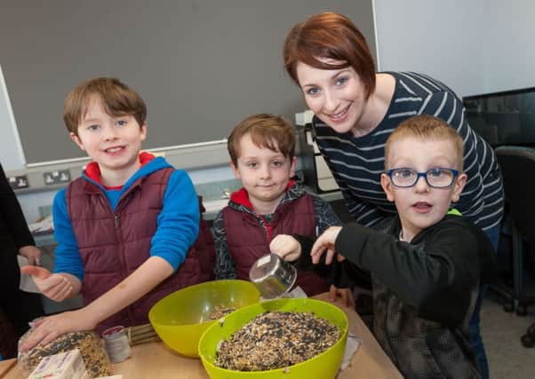Leanne and Jude with Connla and Cadan enjoying themselves at a horticultural workshop organised by the Empower Project at Magherafelt Youth centre.