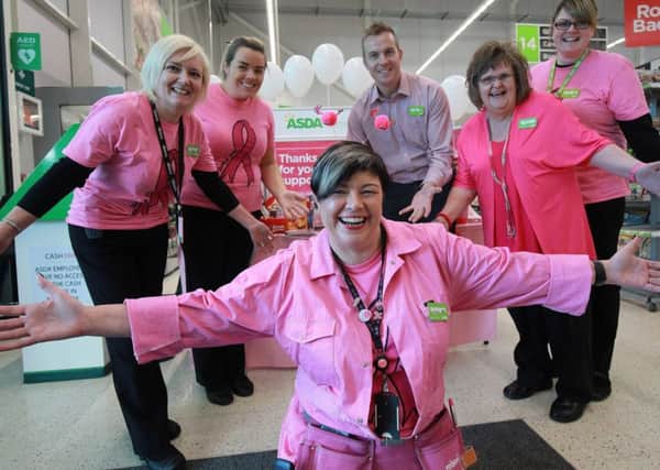 Asda Larne colleagues at the in-store "Tickled Pink" tombola.
