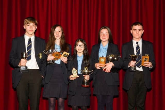 Ryan McCauley, Sophie Davidson, Silvia Dinu, Jodie McCourt and Reece McAllen receiving awards for attainment and endeavour in key stage 3.