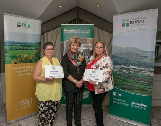 Patricia Mc Quillan MBE and Mary Gibson were presented with their awards from Anne Marie McAleese presented of Your Place and Mine.