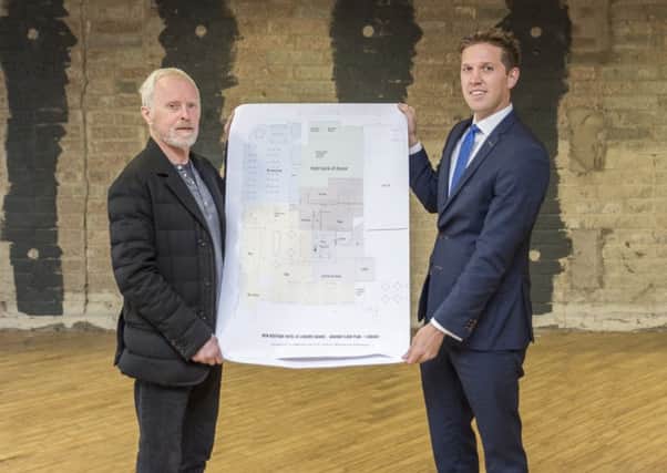 Pictured unveiling plans for the latest addition to the Beannchor Groups hotel portfolio are Bill Wolsey, MD of Beannchor and Nicky McCollum, development director at Lisburn Square.