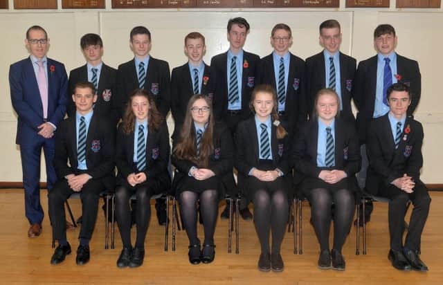 Portadown College pupils who received excellent achievement at GCSE awards at the annual prize day. Also included is vice principal, Mr Peter Richardson, back left. INPT45-201.