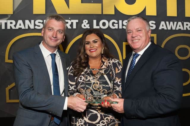Maire Claire with her award presented by Volvo Trucks UK & Ireland Network Truck Sales Director, Joe Roddy (right) and BBC sports presenter Joel Taggart who compered the ceremony.