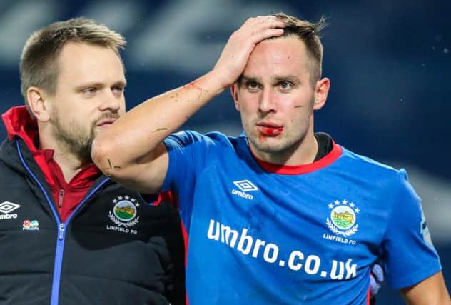 Linfield's Andrew Waterworth after scoring a late equaliser.