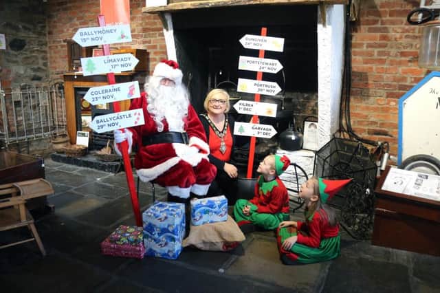 The Mayor of Causeway Coast and Glens Borough Council Councillor Brenda Chivers pictured with Ella Smith and Noah Grieve, pupils at Roe Valley Integrated Primary School, and Santa Claus at Green Lane Museum in Limavady as preparations begin to mark the arrival of the Christmas season across the Causeway Coast and Glens.