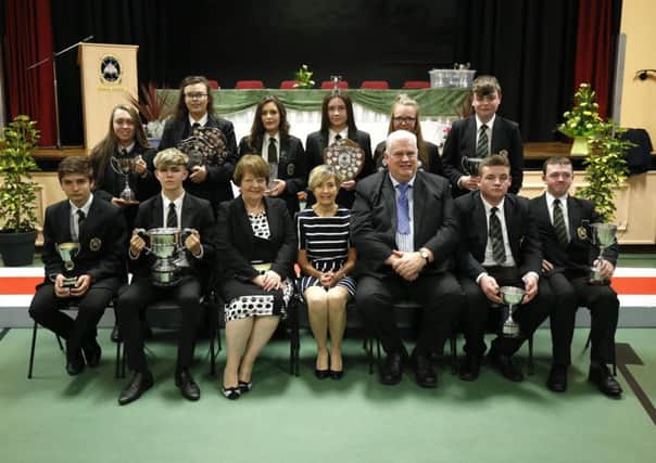 Prize winners of St Patrick's College, Ballymena, with Mrs B Waide, Dr B Best and Dr M Knox, Principal.