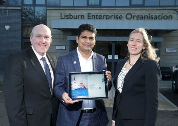 Welcoming CEO of Excelledia, Muhamed Farooque to Lisburn are the chairman of Lisburn & Castlereagh City Council's Development Committee, Alderman William Leathem and CEO of Lisburn Enterprise Organisation, Aisling Owens.