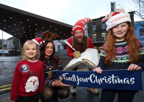 Mayor Cllr Lindsay Millar and Santas little helpers all getting ready for Christmas in Mid and East Antrim.