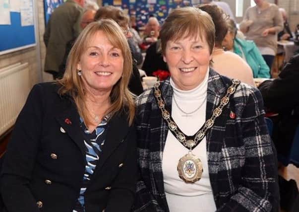 Deputy Mayor Cllr Amanda Grehan and Mayoress Mrs Jennifer Mackin at the Poppy Appeal coffee morning in Magheragall Parish Church which was organised by Councillor William Leathem and his wife Kathleen.