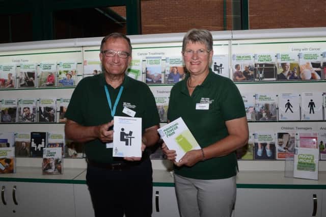 Local Macmillan volunteers David Johnston from Bushmills and Elizabeth Gaston from Portstewart are pictured in the Macmillan Information and Support Area at Causeway Hospital.