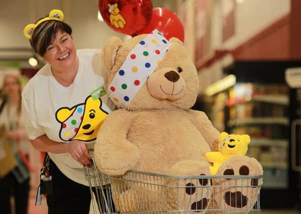 Catherine McCallion, Asda Larne community champion, getting ready to fundraise for BBC Children in Need.