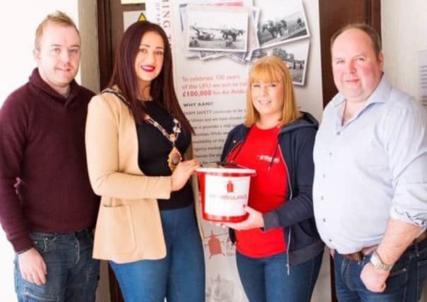 Cllr Mark McKinty and the Mayor, Cllr Lindsay Millar, with Laura Evans, Group manager and John Watt, Group chairman, at the opening of the event.