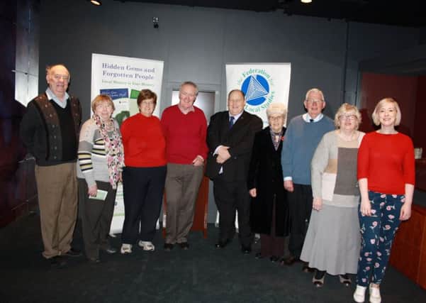 Pictured left to right:  George Elliott, Josephine Herbison (Antrim & District Historical Society) and Vice-Chair of the Fedration; Bridie Bradley (West Belfast Historical Society) and Federation Treasurer; John Dooher (Strabane History Society and Federation Chair; Alderman McKeen; Jennifer and John Hulme (Carrickfergus Historical Society & Federation's Executive Committee); Helen Rankin, Chair of the Carrickfergus Historical Society; and Shirin Murphy, Carrickfergus Museum.