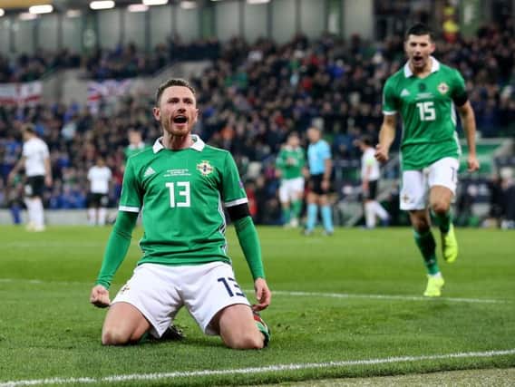 Northern Ireland's Corry Evans celebrates after scoring an equalising goal against Austria