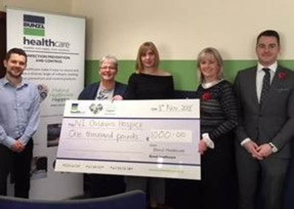 Sharon Gilbert, general manager, Bunzl Healthcare Ireland, Chris Wark, territory manager, Michelle Holmes territory manager, Elaine Brennan, Jonny Martin, from Bunzl Healthcare Ireland, presented a cheque for Â£1,000 to the Northern Ireland Children's Hospice.
