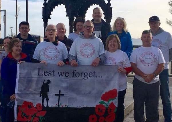 Carrickfergus Royal British Legion held its second annual sponsored walk in memory of late chairman Alan Hamilton Snr in the town.