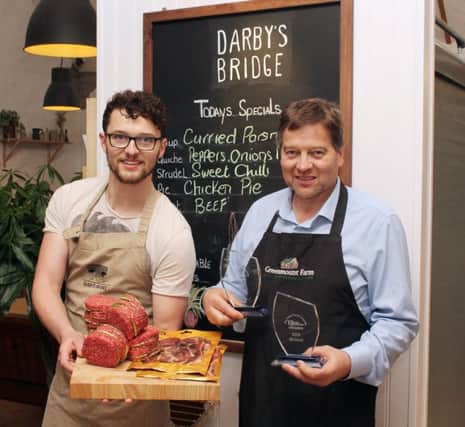 Dean and Stephen Irwin with their Dry Cured Streaky Black Bacon and grass-fed steak burgers and the two bronze trophies picked up in the 2018 Blas na hÃ‰ireann Irish Food Awards for the award-winning produce which comes from the home farm.