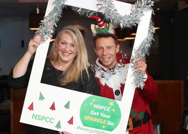 NSPCC Northern Ireland has launched its Light for Every Childhood Christmas Appeal with the help of ambassador and broadcaster Stephen Clements, pictured with Carrick woman and NSPCC corporate and events fundraising manager, Karen Kerr. Photograph by Declan Roughan