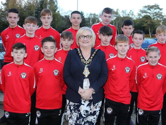 Members of the Bertie Peacock Youth Under 13 team pictured with the Mayor of Causeway Coast and Glens Borough Council.