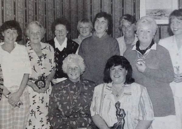 Phyllis Jennings, lady president of Ballyclare Golf Club with winners in her president's day competition. 1997.