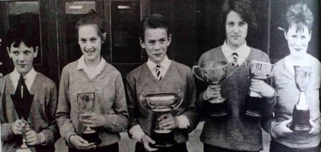 Main prizewinners at St Comgall's High School sports day. From left: Patrick Steele, Tracey Shannon, Eamon McLaughlin, Lisa Neill and Paula  1989