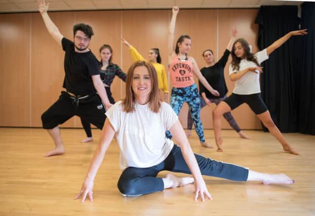 North West Regional College Dance Lecturer Carie Logue Houston with Performing Arts students from the college. (Pic Martin MCkeown)