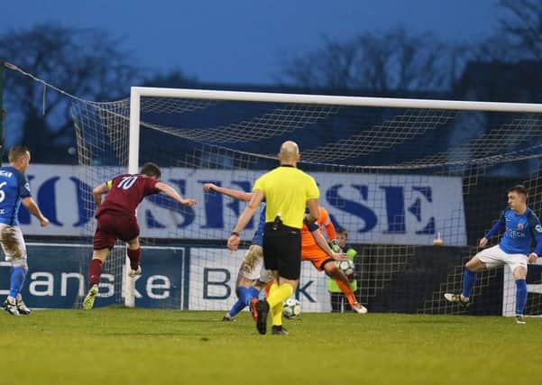 Michael McCrudden slots home to make it 3-2 to Institute against Glenavon. Pic by Pacemaker.