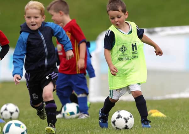 Children pictured at the Beltoy Playing Fields, Carrickfergus, Hughes Insurance Irish FA
Summer Football Camp. Over 200 camps will be delivered, supporting 17,000 children aged between five and 13. 

Hughes Insurance is proud to be sponsoring grassroots football across Northern Ireland.

Picture by William Cherry/PressEye.com