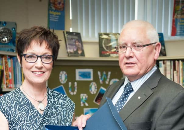 Mrs Lynda Currie, principal, and Mr Tom McKay, chairman of the Board of Governors at Lurgan Junior High School.  INLM2614-401