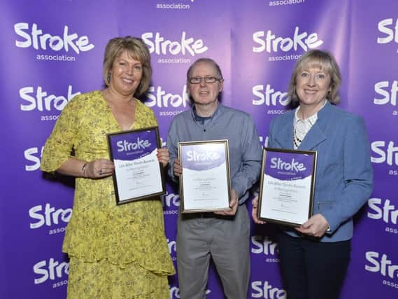 Volunteers Lynda Kingston, Colin and Heather Parks received a presentation at the recent Northern Ireland Life After Stroke Awards.