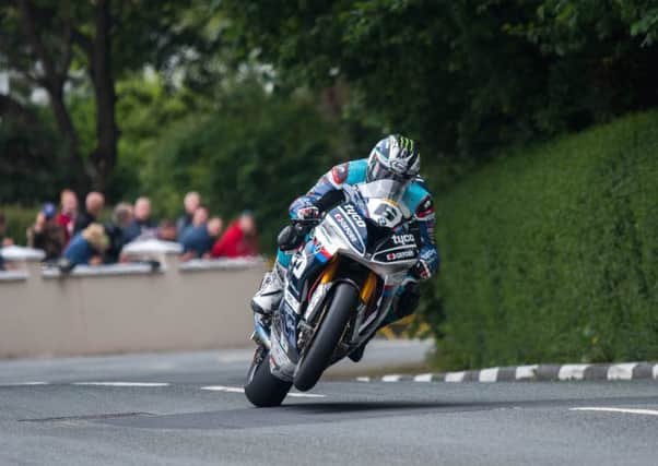 Michael Dunlop on his way to victory in the RST Superbike race at the Isle of Man TT.