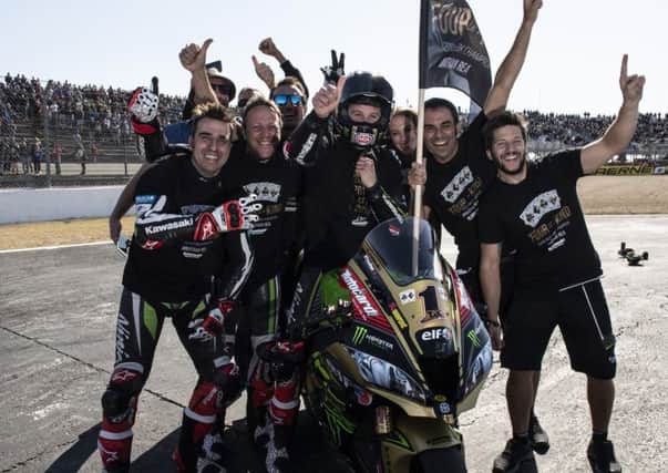 Jonathan Rea celebrates his record-equalling fourth World Superbike title at Magny-Cours in France in September.