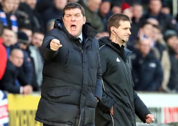 St Johnstone manager Tommy Wright (left) instructs his players during the game against Rangers