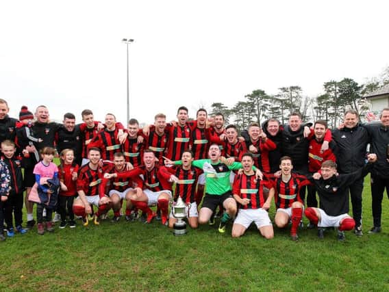 Banbridge Town celebrate their Bob Radcliffe Cup success following the 4-0 win in the final over Dollingstown