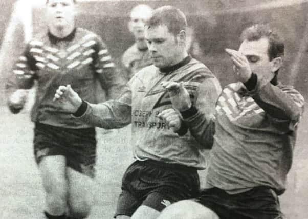 Scarva Rangers Gary Chambers and John McAdam, Banbridge Town Seconds tussle for the ball during a match in 1995.
