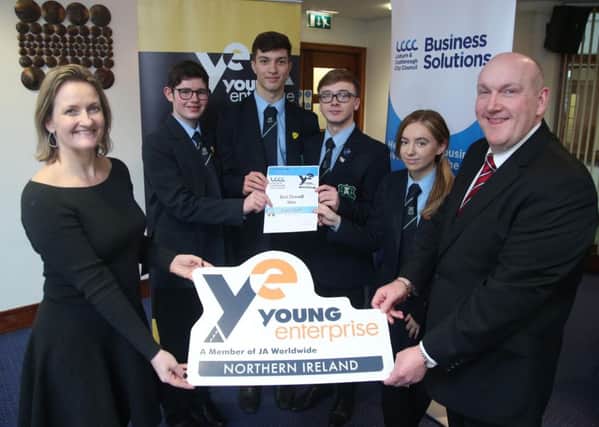 The winning team from FortHill Integrated College are pictured at the final of 'Digital Youth' with Alderman William Leathem, Chairman of the Council's Development Committee and Carol Fitzsimons MBE, Chief Executive with Youth Enterprise NI.