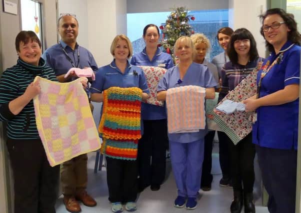 A presentation of knitted items to Antrim Hospital's Neonatal Appeal from friends and members of Carrickfergus Garden Scoiety took place on December 15.