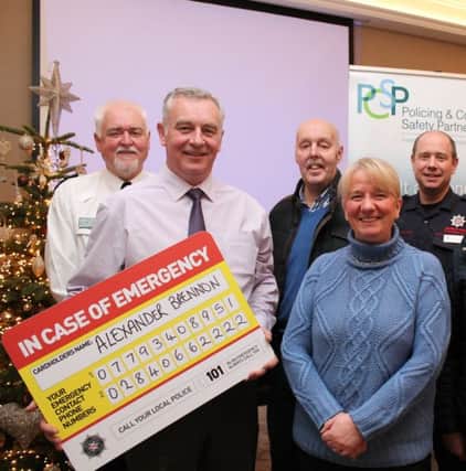 Pictured at the launch of the in case of emergency card (ICE Card) Chief Inspector Barney OConnor, PCSP Project Officer Billy Stewart, PCSP members Alderman Junior McCrum and Beverley Burns, Crew Commander Lee Murray, NIFRS.