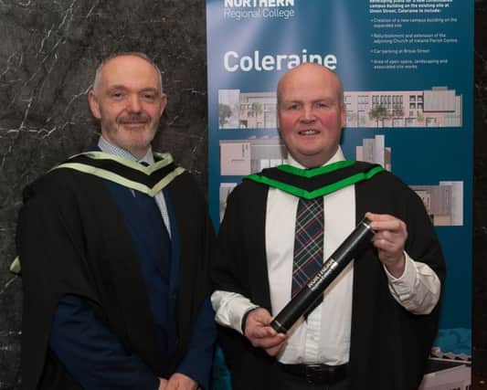 Course Director Pat Condren is pictured with Johnny Goldie who
has graduated from Northern Regional College with a Foundation Degree in Building Technology and Management.