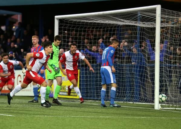 Linfield's Jimmy Callacher scores the opening goal against Ards
