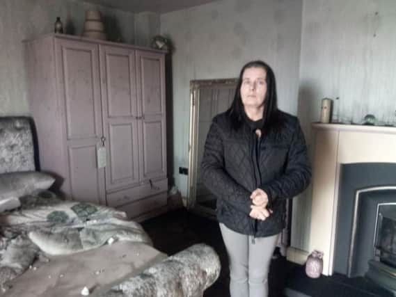 Caroline Gordon in her bedroom which was destroyed by the dense smoke