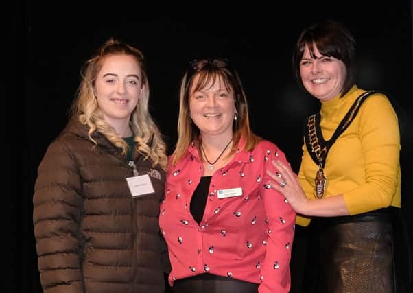 Julie Flaherty, Lord Mayor of Armagh City, Banbridge and Craigavon Borough Council with graduate Tiarna McIlroy from Lurgan and Tracy Wilson Family Nurse.