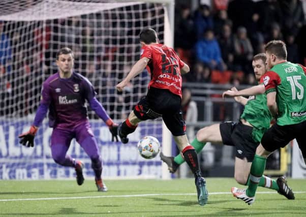 Paul Heatley fires home his second goal on Saturday for Crusaders against Glentoran. Pic by Pacemaker.
