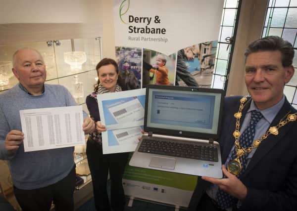 Mayor of Derry City and Strabane District, Councillor John Boyle, pictured with Willie Lamrock, Chair of Derry and Strabane Rural Partnership and Deirdre Harte, Rural Development Manager, DCSDC, as part of a local campaign to encourage people in rural areas with no or poor broadband to check if their postcode has been included in the published lists for the Â£150 million Government Broadband scheme Project Stratum.  Photo: Jim McCafferty Photography)