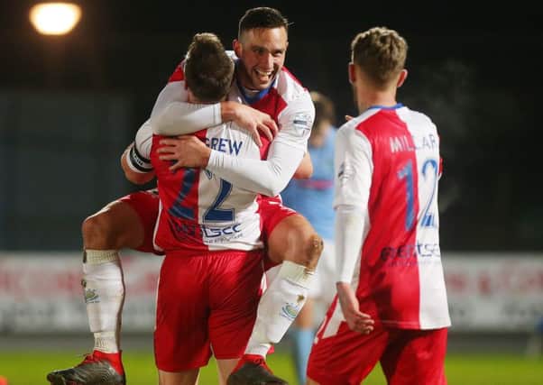 Celebration time for Linfield's Andy Waterworth against Ballymena United. Pic by PressEye Ltd.