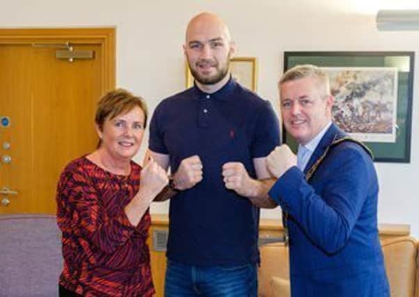 Steven Ward pictured with Mayor of Antrim and Newtownabbey Borough Council, Cllr Paul Michael and Chief Executive, Mrs Jacqui Dixon.